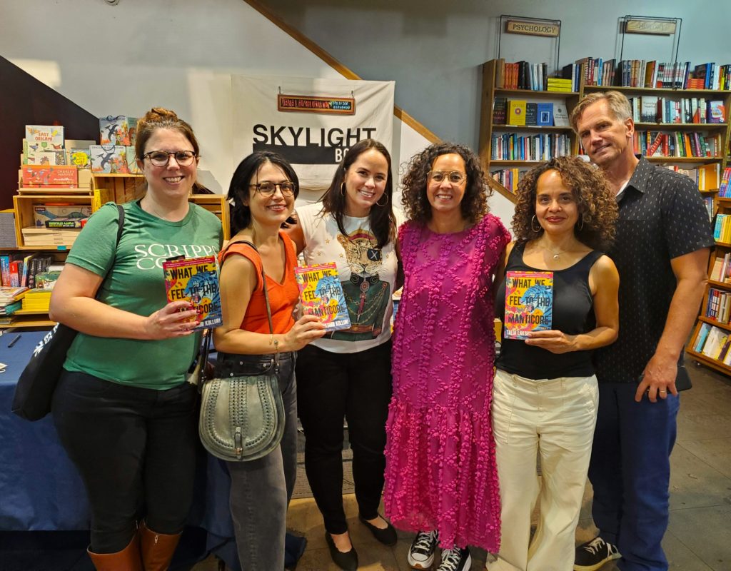 Talia and friends stand in Skylight books